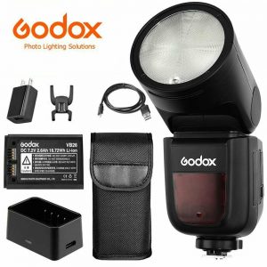 Godox roundhead flash, case, battery, charger, and foot accessories